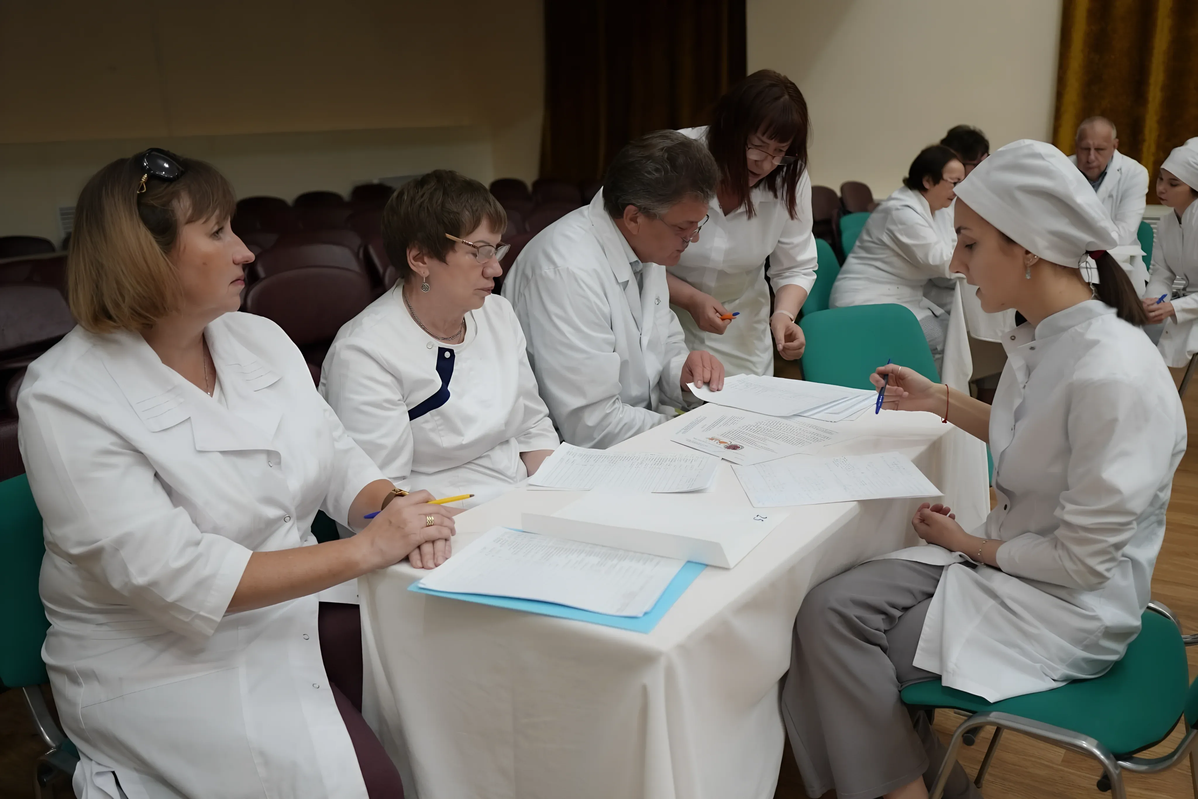 Examination committee evaluating medical students