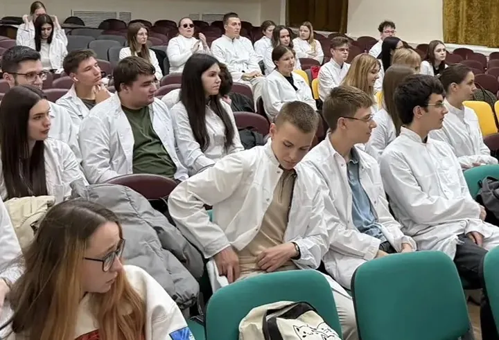 Medical students discussing scientific research opportunities